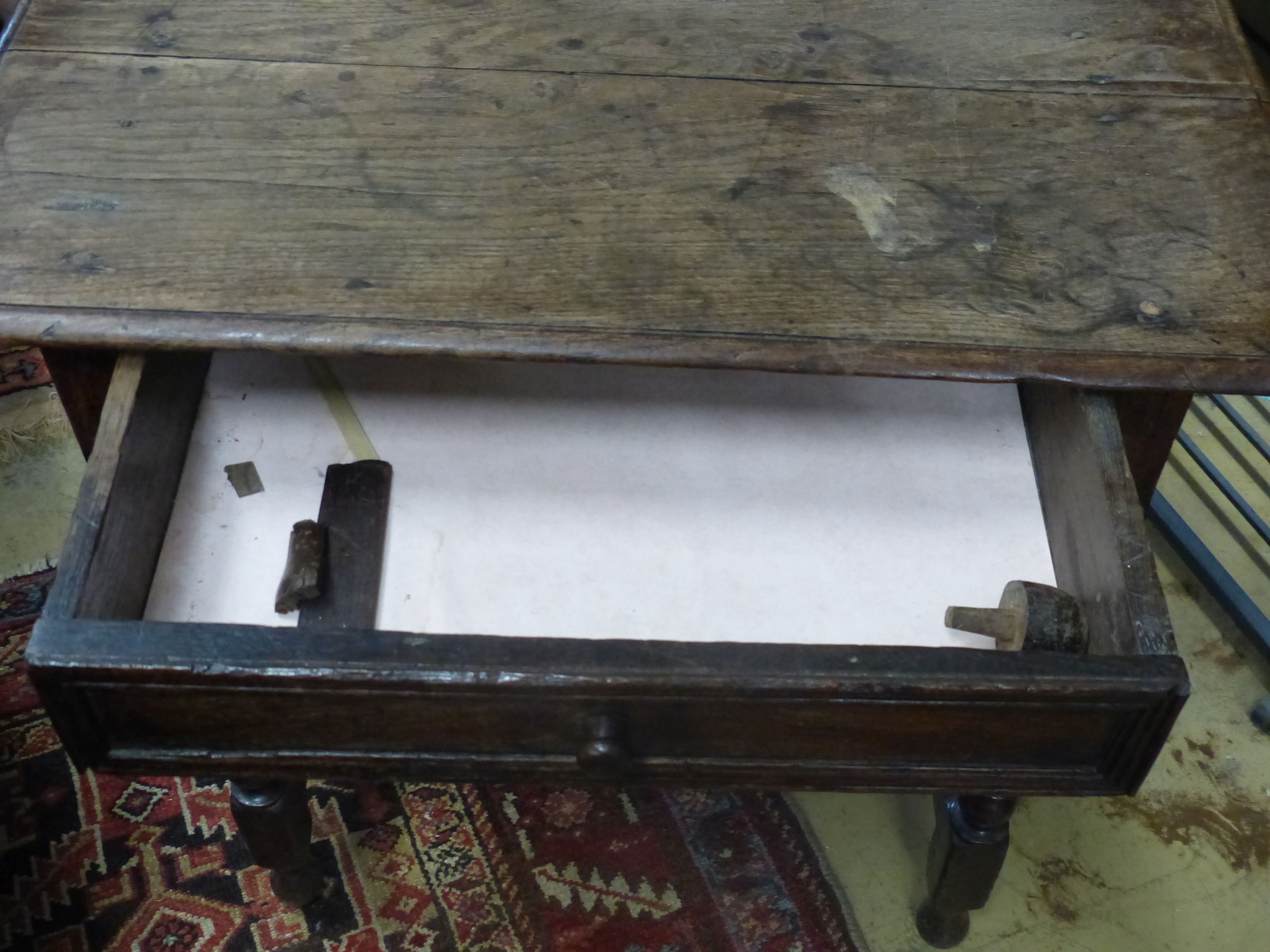 An oak side table, 18th century and later, width 76cm, depth 47cm, height 75cm